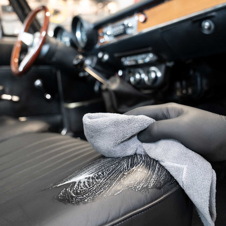 Detailing1 COLOURLOCK Classic Car Leather Care Set — wiping the lifted dirt off a classic car seat