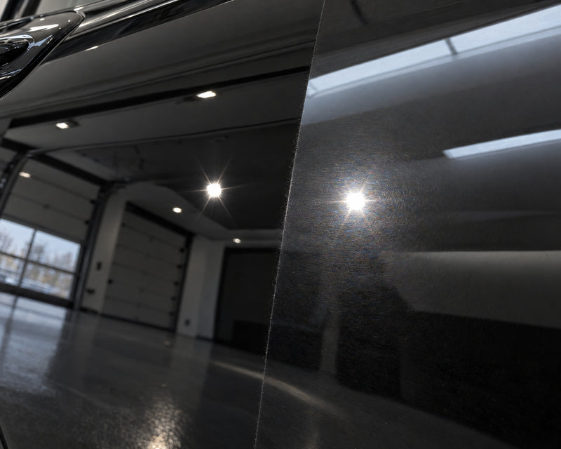 Detailing1 taped-off edge — left a clear mirror after polishing, right hologram haze around the reflected ceiling spot